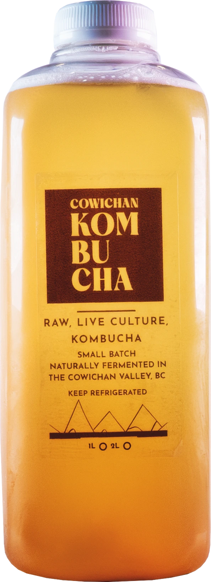 Kombucha bottle with 'Cowichan Kombucha' branding on a white background